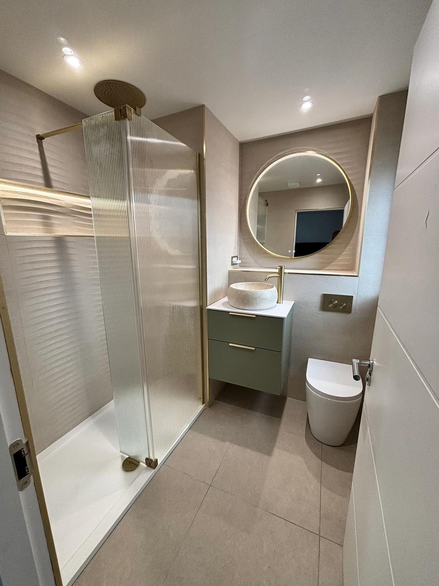 Gold and sage en-suite with fluted glass shower screen, fitted by CDM
